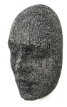 This contemporary metal wall sculpture is a mask. Image 6