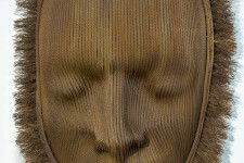 A mask of steel aircraft cable is framed by a halo of unwound ends. Image 5