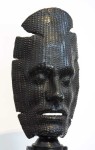 This powerful and haunting life-sized mask by Dale Dunning is cast in bronze and sits on its own pedestal. Image 3