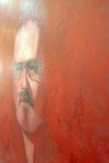 In this haunting self-portrait by Canadian realist Dan Hughes, the artist’s face seems to emerge from a rich red background. Image 8