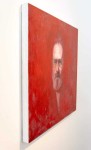 In this haunting self-portrait by Canadian realist Dan Hughes, the artist’s face seems to emerge from a rich red background. Image 4