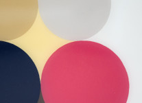 Orchestrated circular shapes of camel, gray, dark navy and coral red with light yellow and brown that define the white ground of this 17 inc… Image 2