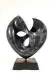 The lyrical lush lines of this heart-shaped bronze sculpture were created by the American artist David Chamberlain. Image 4