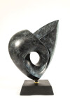 The lyrical lush lines of this heart-shaped bronze sculpture were created by the American artist David Chamberlain. Image 6