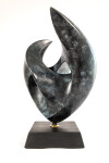 The lyrical lush lines of this heart-shaped bronze sculpture were created by the American artist David Chamberlain. Image 2