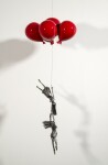 This figurative steel kinetic indoor sculpture challenges cultural norms about women. Image 5