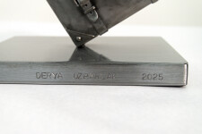 This figurative steel indoor sculpture is made by Derya Ozparlak. Image 6