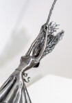This contemporary figurative indoor sculpture of a female is hand forged from metal. Image 6