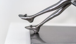 This contemporary figurative indoor sculpture of a female is hand forged from metal. Image 11