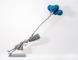 This contemporary figurative indoor sculpture of a female is hand forged from metal.