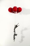 This figurative steel kinetic indoor sculpture challenges cultural norms about women. Image 4