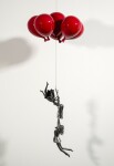 This figurative steel kinetic indoor sculpture challenges cultural norms about women. Image 6