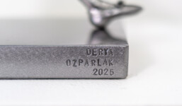 This contemporary figurative indoor sculpture of a female is hand forged from metal. Image 13