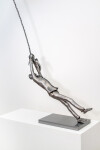 This figurative indoor sculpture of a male is hand forged in steel. Image 4