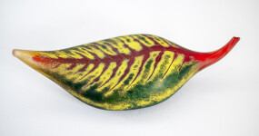 Australian glass artist Eileen Gordon’s leaf in jewel tones of red and forest green captures the lovely organic shape of a fallen leaf. Image 9