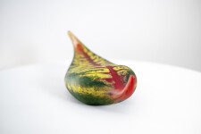 Australian glass artist Eileen Gordon’s leaf in jewel tones of red and forest green captures the lovely organic shape of a fallen leaf. Image 5