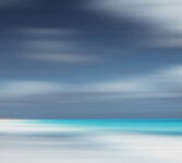 The blurring of time and space captured in time-lapse photography while the photographer is in motion has resulted in a lined pale beach, ce… Image 3