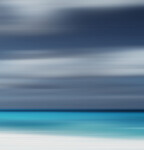 The blurring of time and space captured in time-lapse photography while the photographer is in motion has resulted in a lined pale beach, ce… Image 2