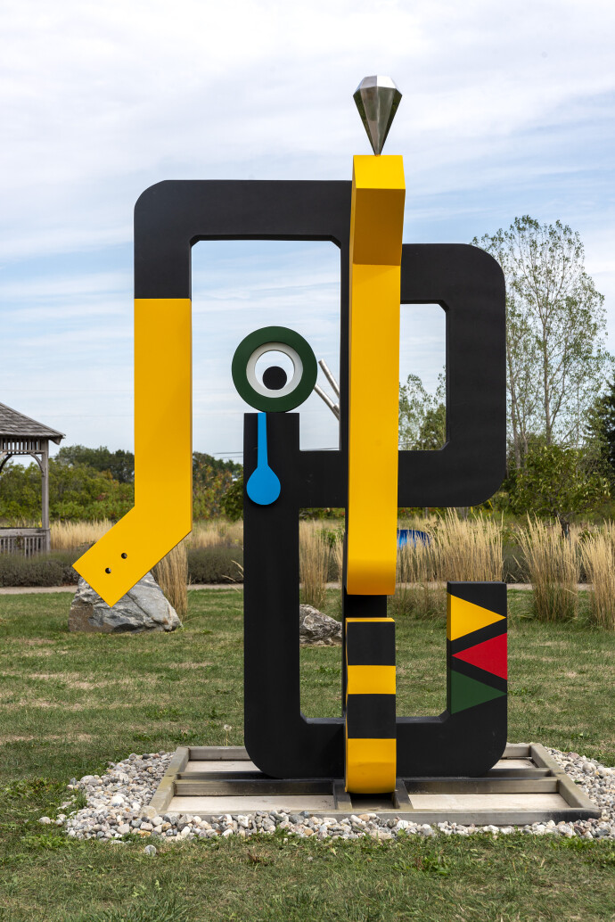This contemporary abstract outdoor painted steel sculpture is figurative.