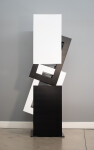 This abstract sculpture, which can also be installed outside, is painted in a striking black and white. Image 7