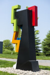 This contemporary abstract outdoor steel sculpture represents a male figure. Image 2