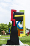 This contemporary abstract outdoor steel sculpture represents a male figure. Image 10