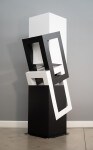 This abstract sculpture, which can also be installed outside, is painted in a striking black and white. Image 4