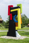 This contemporary abstract outdoor steel sculpture represents a male figure. Image 8