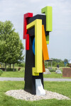 This contemporary abstract outdoor steel sculpture represents a male figure. Image 7
