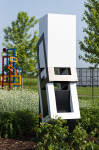 This abstract sculpture, which can be installed indoors or outdoors, is painted in a striking black and white. Image 12