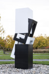 This abstract sculpture, which can be installed indoors or outdoors, is painted in a striking black and white. Image 9