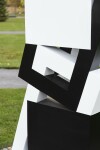 This abstract sculpture, which can also be installed outside, is painted in a striking black and white. Image 13