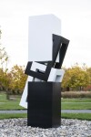 This abstract sculpture, which can also be installed outside, is painted in a striking black and white. Image 22