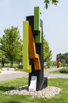 This contemporary abstract outdoor steel sculpture represents a male figure. Image 5