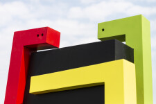 This contemporary abstract outdoor steel sculpture represents a male figure. Image 14