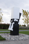 This abstract sculpture, which can be installed indoors or outdoors, is painted in a striking black and white. Image 8