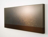 Like the iridescent light of a silvery sea, the polished surface of this steel wall sculpture just glows. Image 2