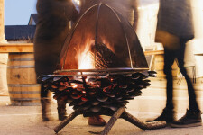 This contemporary outdoor metal sculpture of an acorn by Floyd Elzinga can also burn wood. Image 4