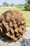 This large outdoor pop art sculpture was hand-forged in steel; its form was inspired by nature. Image 6