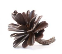 This contemporary table top metal sculpture of a pine cone is by Floyd Elzinga.