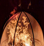 This contemporary outdoor metal sculpture of an acorn by Floyd Elzinga can also burn wood. Image 8