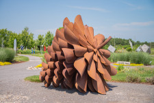 The large pine cone sculptures by Floyd Elzinga have become beloved and collected classics that now grace many public venues in the country. Image 7