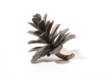 Hand forged from bronze; this delightful tabletop sculpture of a pine cone is by Floyd Elzinga. Image 2