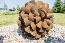 This large outdoor pop art sculpture was hand-forged in steel; its form was inspired by nature. Image 5