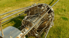 This contemporary outdoor monumental metal sculpture by Floyd Elzinga resembles a dandelion seed. Image 4