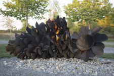 This large outdoor pop art sculpture was hand-forged in steel; its form was inspired by nature. Image 8