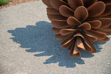 The large pine cone sculptures by Floyd Elzinga have become beloved and collected classics that now grace many public venues in the country. Image 3