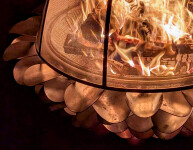 This contemporary outdoor metal sculpture of an acorn by Floyd Elzinga can also burn wood. Image 7