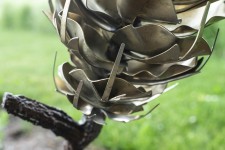 Floyd Elzinga’s beautiful pine cone sculptures emulate the organic shape, texture and form of the natural object. Image 6