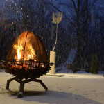 This contemporary outdoor metal sculpture of an acorn by Floyd Elzinga can also burn wood. Image 3